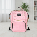 Tots Basics Diaper Bag Backpack in black, front view with multiple compartments.