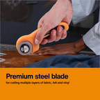 Close-up of stainless steel 45mm rotary blade for fabric cutting