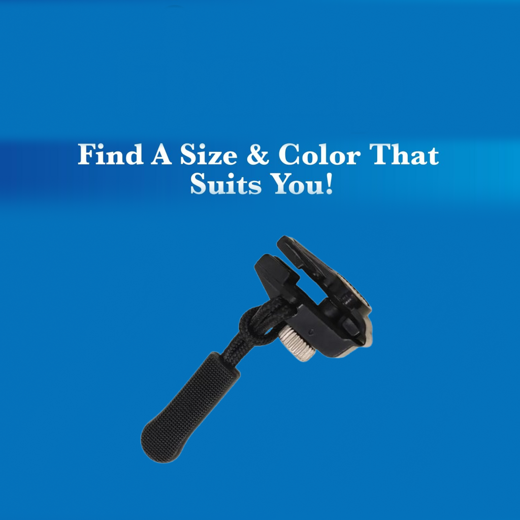 The detachable zipper slider next to a pair of jeans, highlighting its use for clothing repairs.
