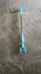 Lifestyle shot of the adjustable clothes hook making laundry easier.