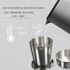 Compact stainless steel camping cup attached to backpack with keychain.