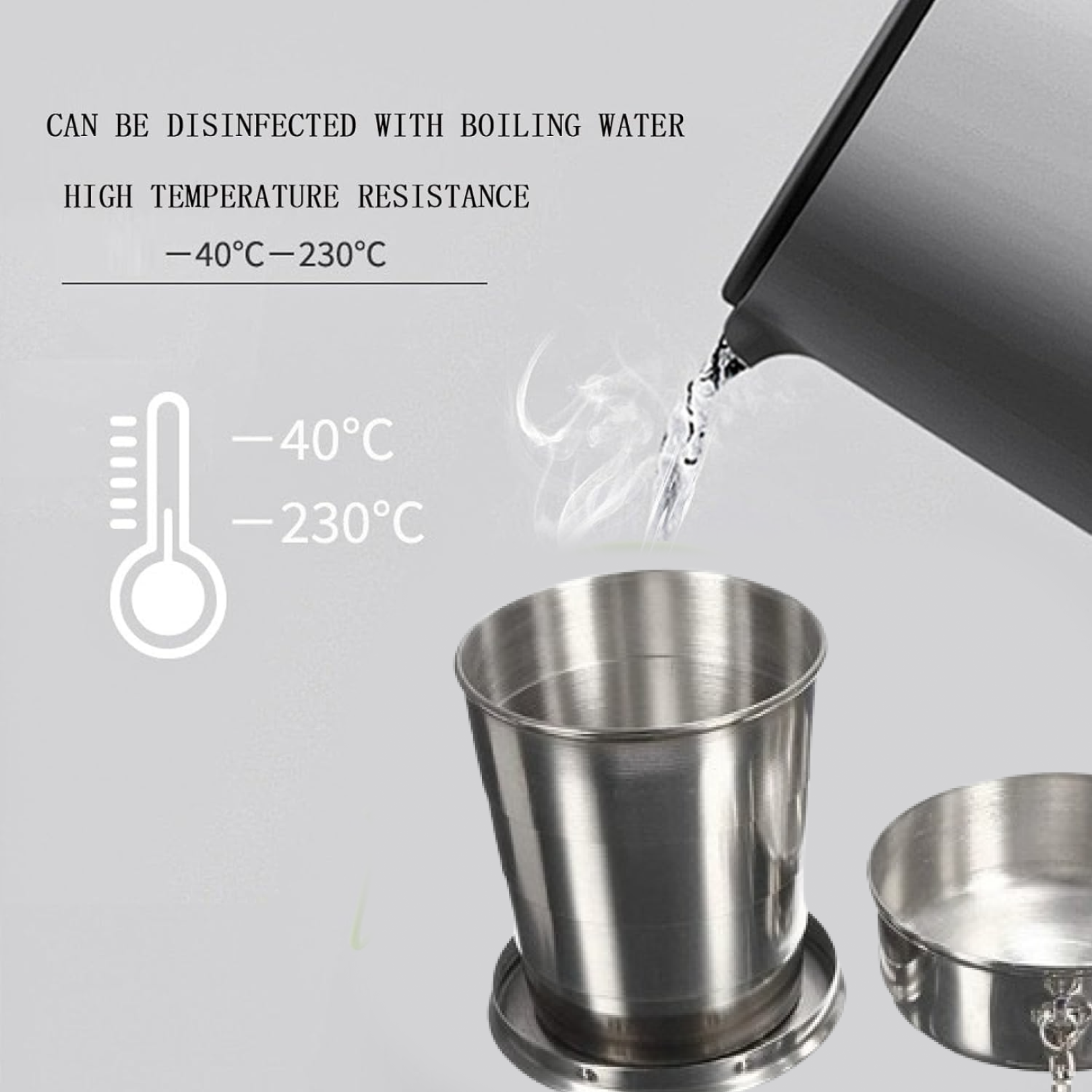 Compact stainless steel camping cup attached to backpack with keychain.