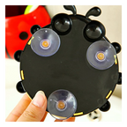 Rear view of the Ladybug toothbrush holder, highlighting its powerful suction hook.