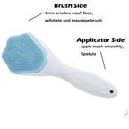 A hand holding the gentle silicone face scrubber for easy grip.
