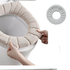 A modern bathroom scene featuring the comfortable and warm Toilet Seat Cover for enhanced experience.