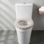 Plush Toilet Seat Cover in a serene white bathroom setting, offering warmth and comfort.