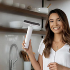 Angled view of the Portable Self-Squeeze Mini Mop, showcasing its compact size.