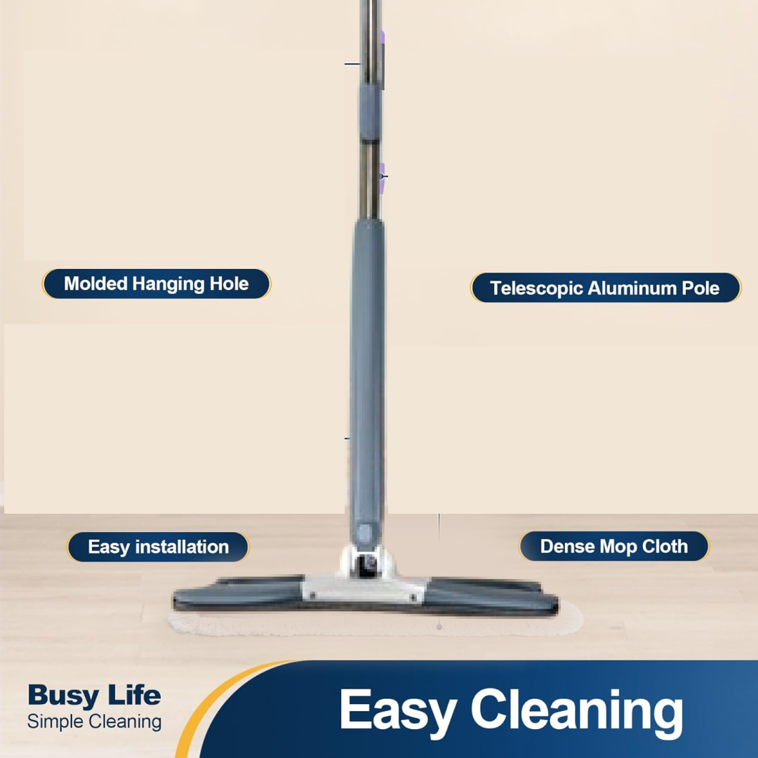 User demonstrating the easy squeeze mechanism of the mop to wring out water from the pad.