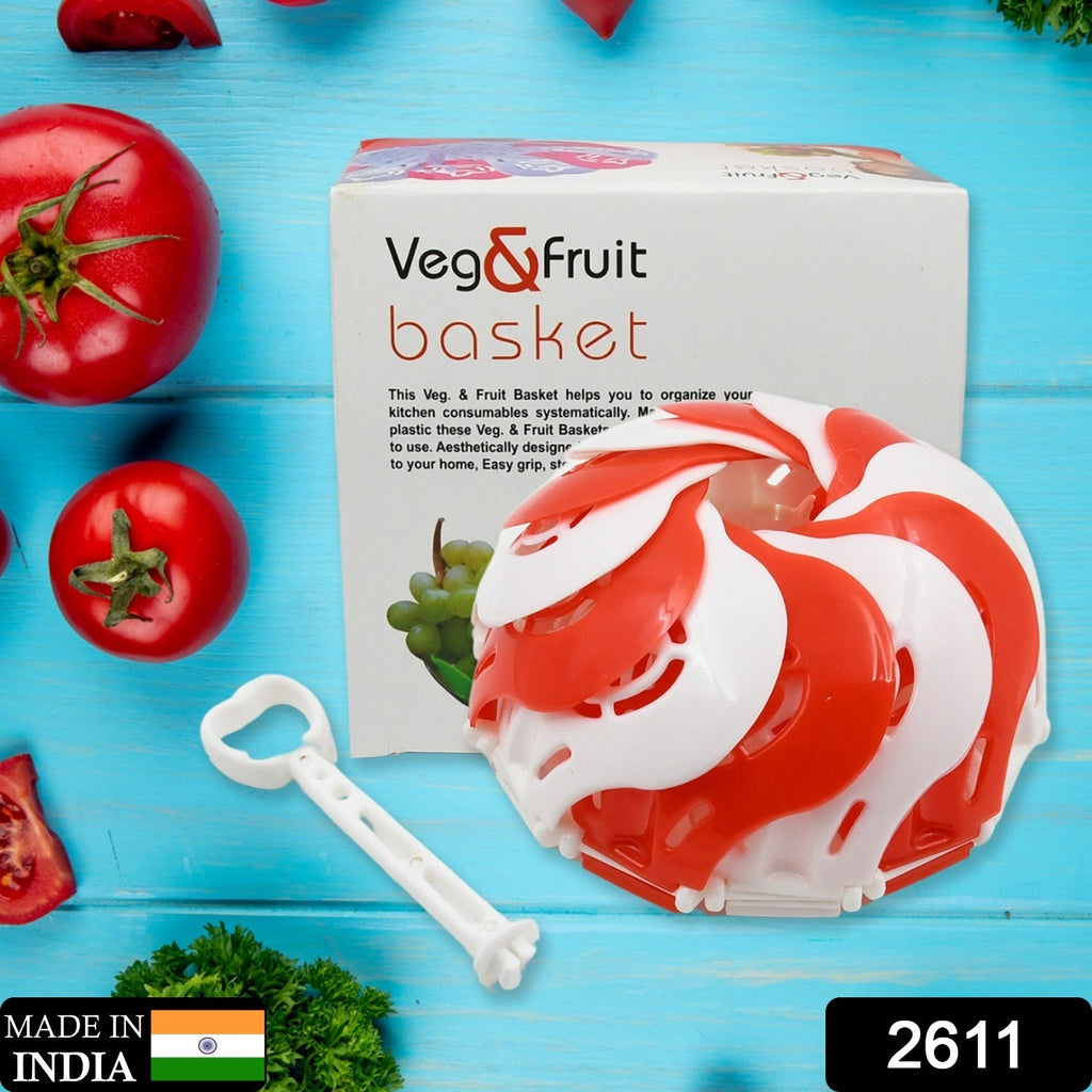 Unfolded lotus folding fruit basket, brimming with fresh fruits on a modern kitchen counter.