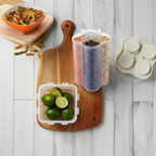 Clear plastic 4 section food storage container with a secure locking lid.
