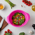 Stack of durable plastic snack bowls in a kitchen setting.