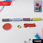 Assorted threads, bobbins, and sewing tools in the kit