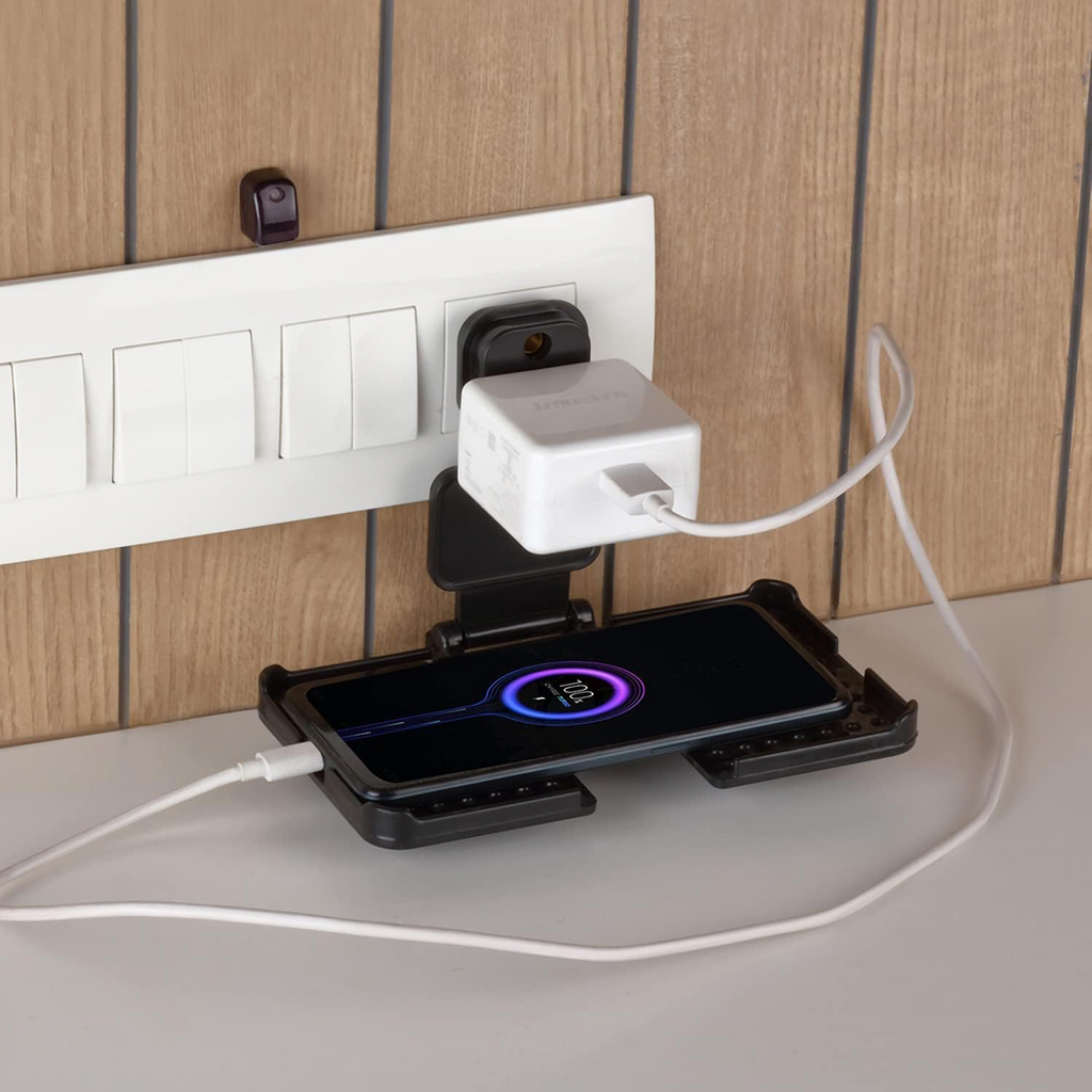 The compact design of the PHOBIA black mobile charging wall holder.