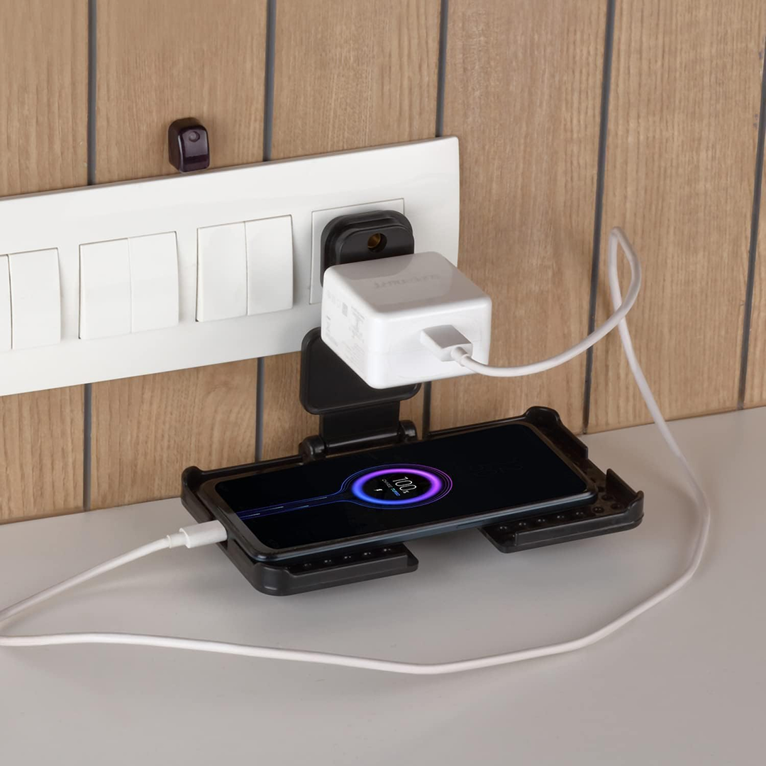 The compact design of the PHOBIA black mobile charging wall holder.