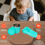 A side view of the snack tray and steel cup, highlighting its ergonomic design.