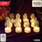 Close-up of golden leaf shaped LED candles flickering softly