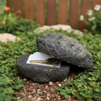 View of the secure hidden storage compartment inside the fake rock for keys.