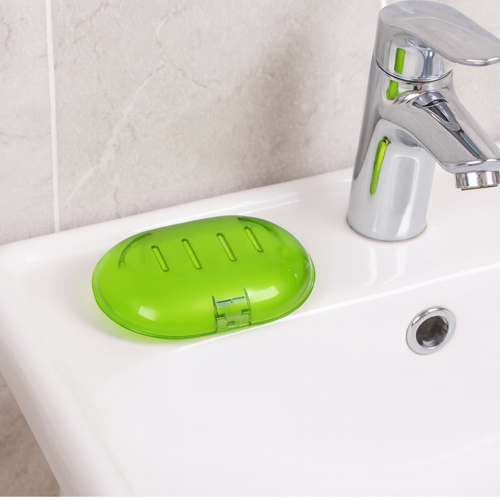 Close-up of the wall-mounted plastic soap dish highlighting its sturdy design.