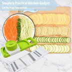 Various vegetables like carrots and potatoes being sliced and julienned by the multi-blade slicer.
