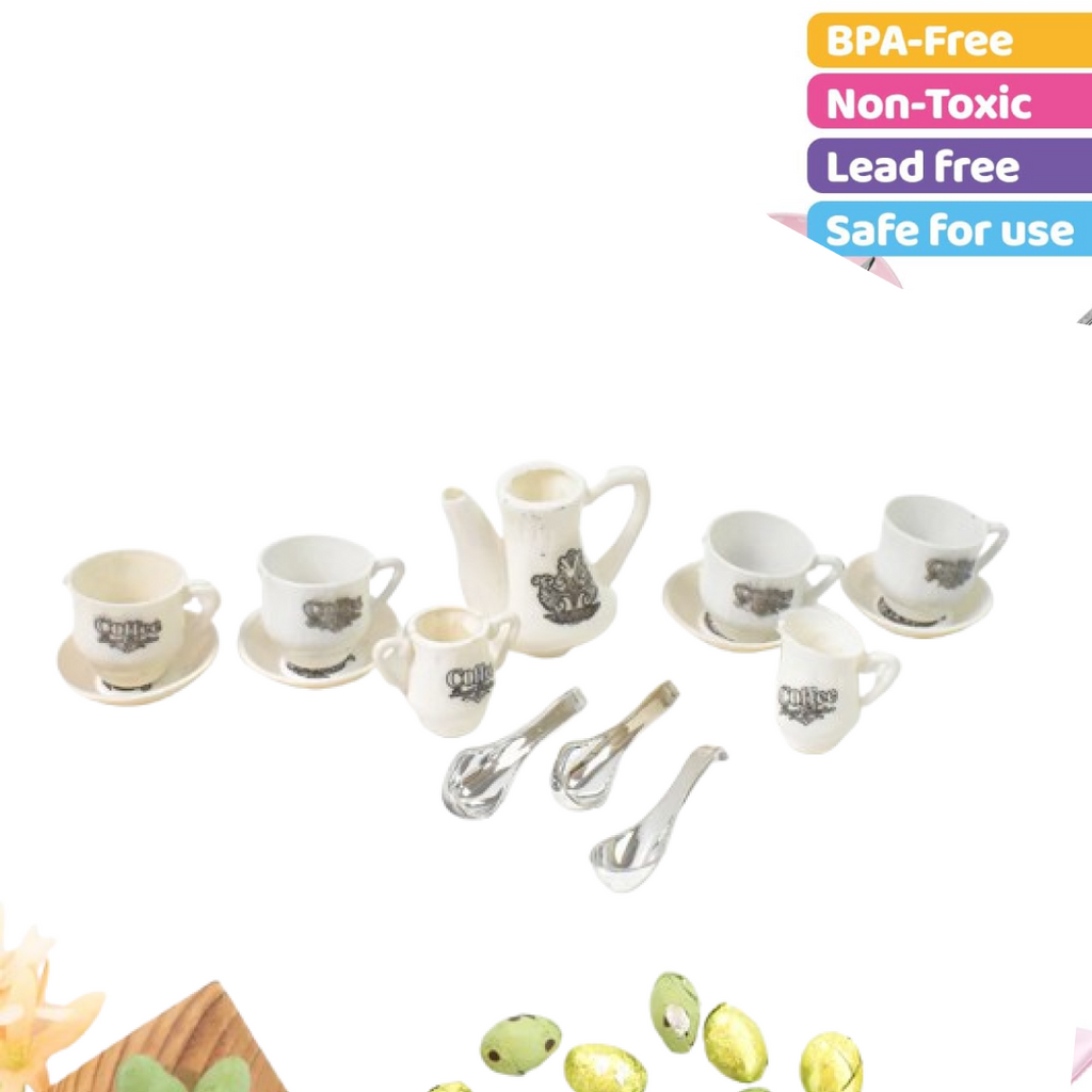 Close-up of a miniature plastic tea kettle and milk pitcher for pretend play.