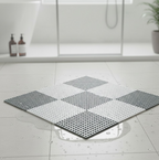 Measurement and technical sheet detailing the compact anti-slip bath mat.