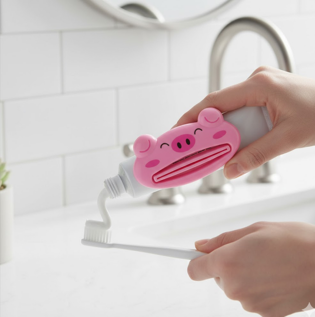 Different angle of animal toothpaste squeezer showcasing its functionality.