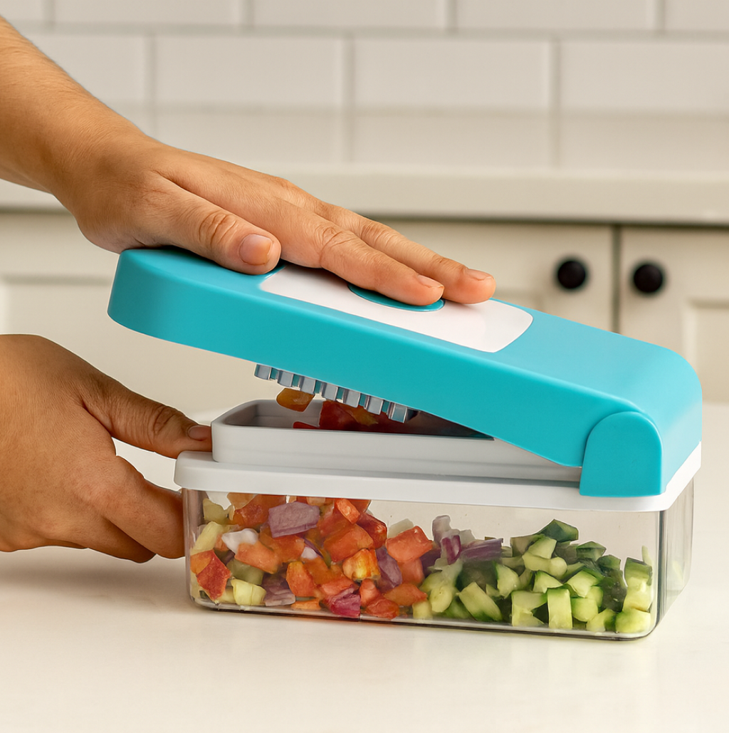 All detachable components of the blue Ganesh 7-in-1 vegetable cutter laid out.