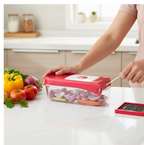 Top-down view of the Ganesh red vegetable chopper with its lid and pulling mechanism.