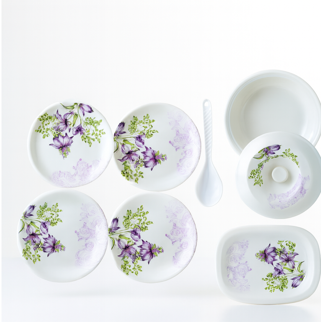 Full view of the 32-piece plastic tableware set, featuring plates, bowls, and serving dishes.