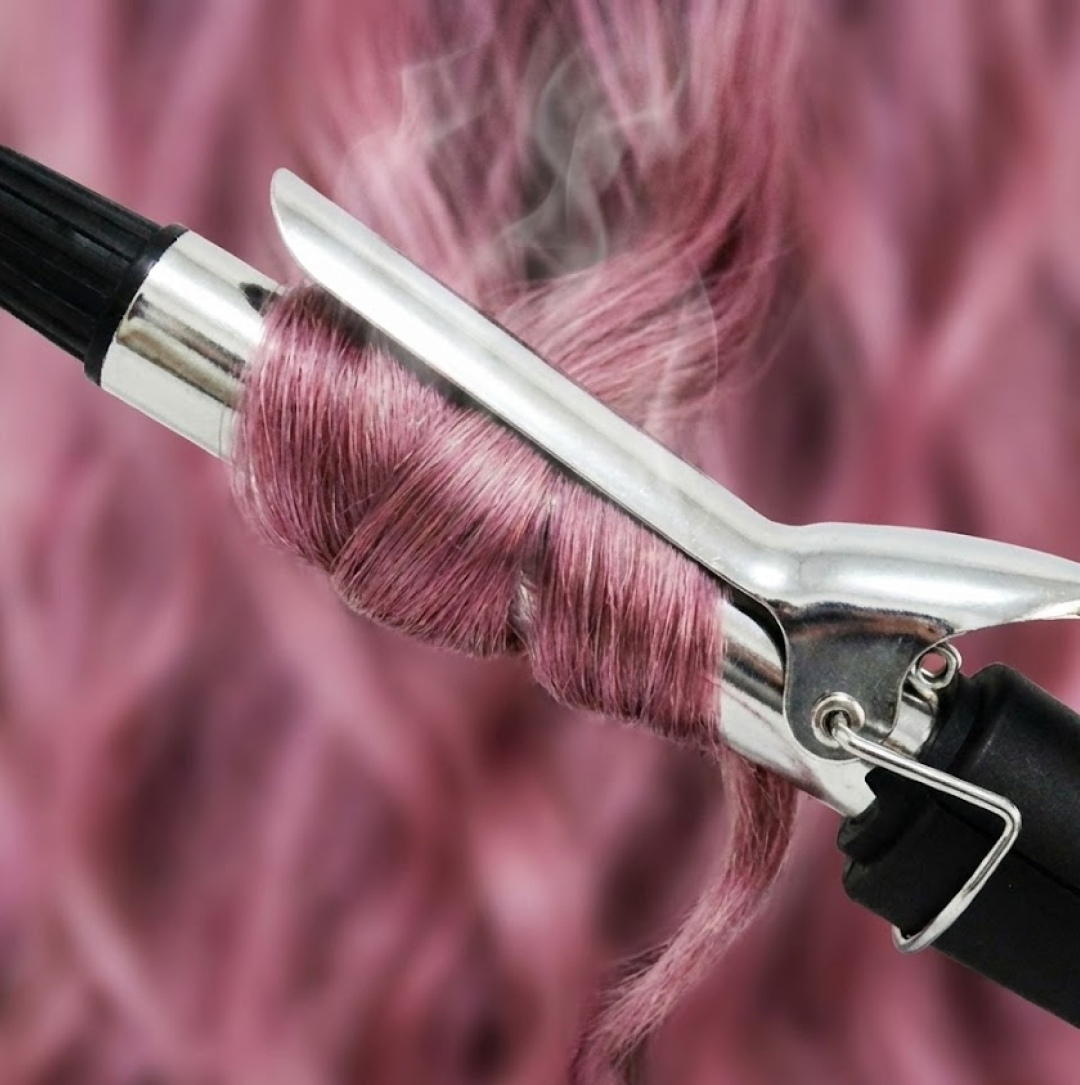 Side view of the hair curling iron, highlighting its sleek design.