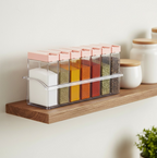 Multiple views of the durable plastic spice jars for kitchen storage.