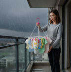 Compact round laundry drying rack, ideal for small spaces and travel.