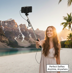 User holding the compact selfie stick for a perfect group photo.