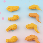 An 8-piece set of fun chicken erasers, featuring both chicken wing and leg shapes, displayed neatly.