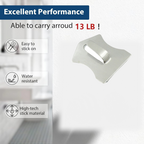 Stainless steel wall hooks organizing kitchen utensils and towels efficiently.