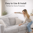 Person covering a beige sofa with a clear disposable furniture cover.