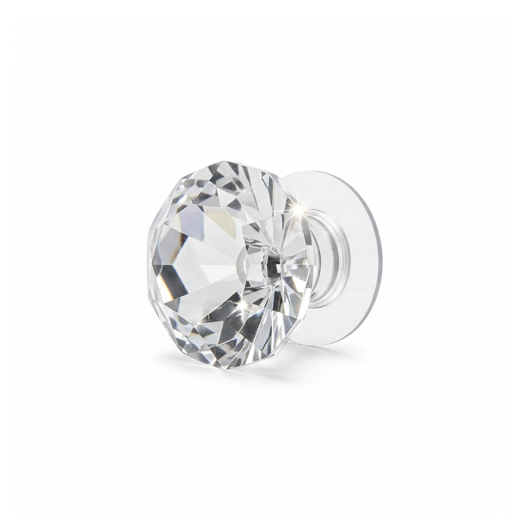 Diamond crystal pull handle enhancing a white cupboard door, adding a touch of glamour.