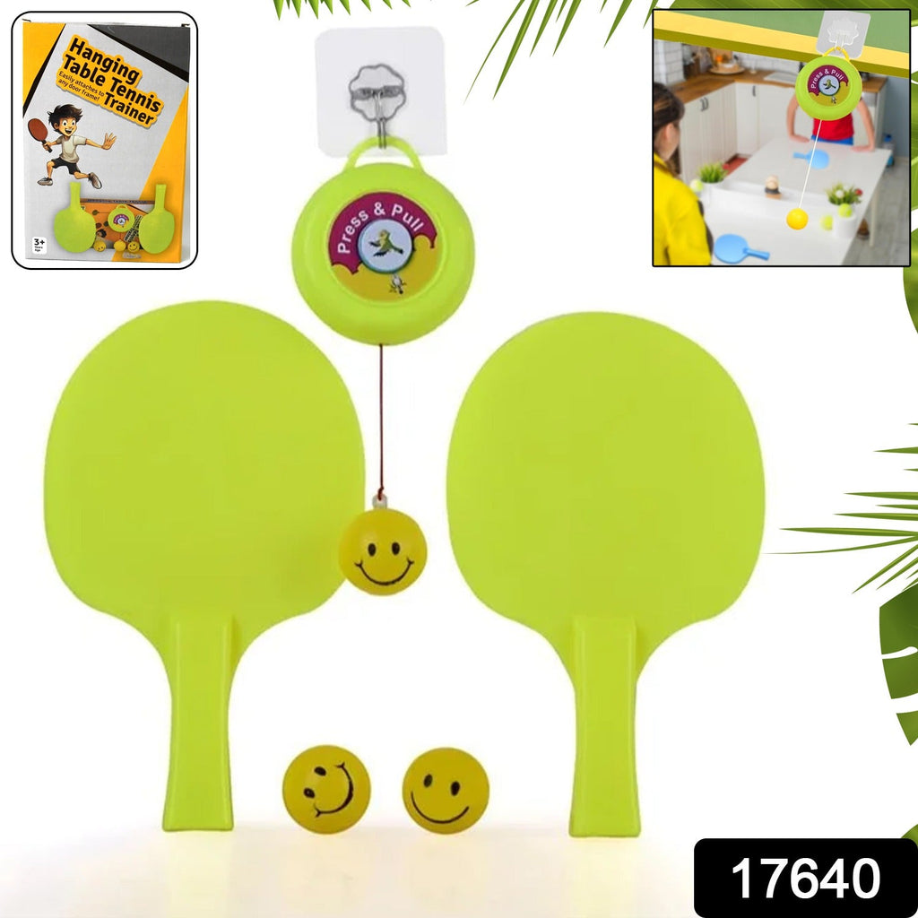 A child enthusiastically playing with the Dollovia portable table tennis trainer, improving hand-eye coordination.