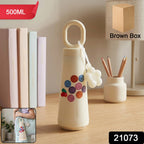 Closed 500ml glass water bottle with handle and cherry charm for easy carrying