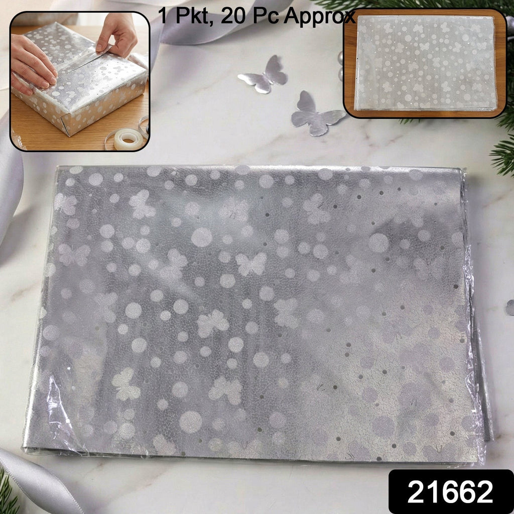 Assorted silver gift wrapping paper sheets in mixed colors and patterns