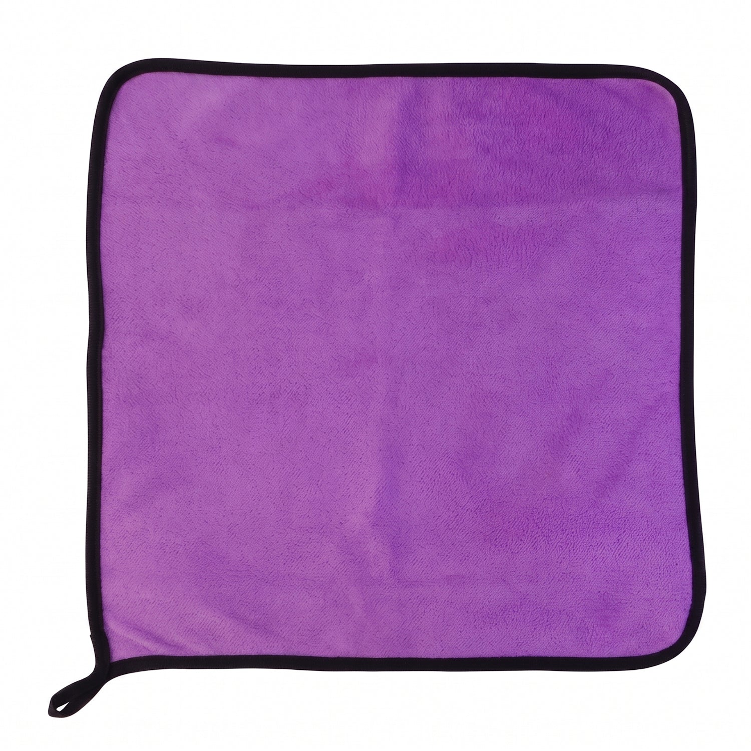Multi-purpose purple microfiber cleaning cloth on surface