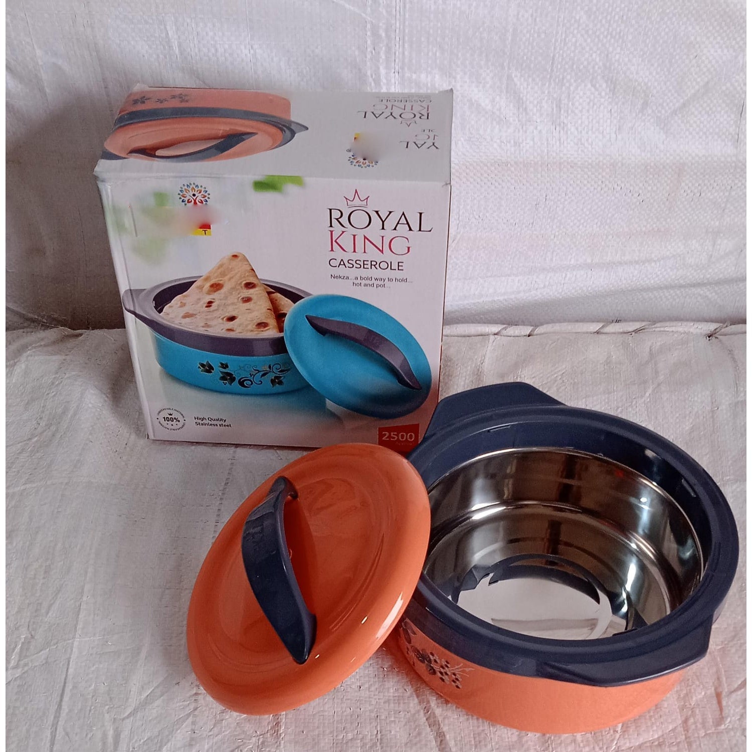 Multi-purpose insulated box keeping various hot foods fresh for family meals.