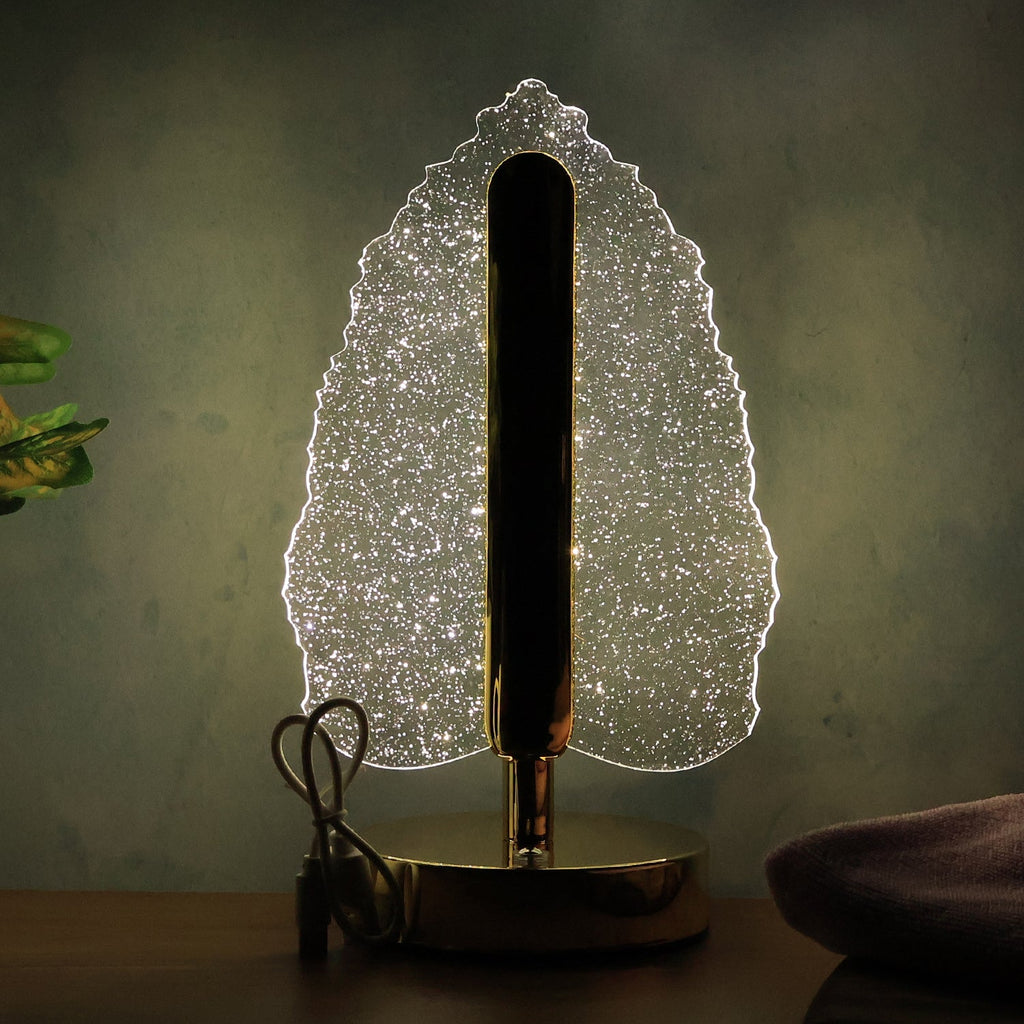 Decorative LED table lamp casting unique reflections with USB power feature