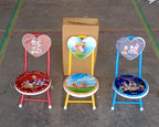 The lightweight kids folding chair ready for transport or storage.