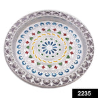 Silver plated pooja thali with a subtle design, enhancing your festive rituals.