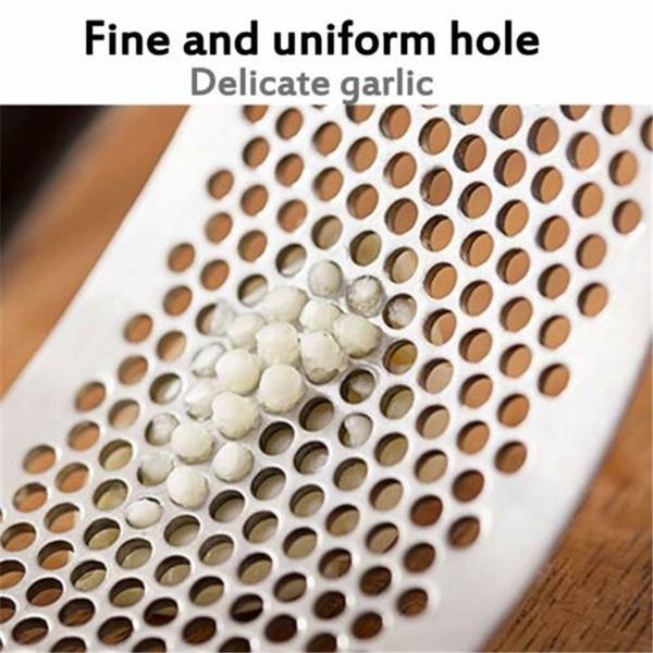 Top-down view of the premium stainless steel garlic press, a versatile kitchen tool.