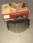 Stainless steel garlic press showing its large capacity and easy-clean design for kitchen efficiency.
