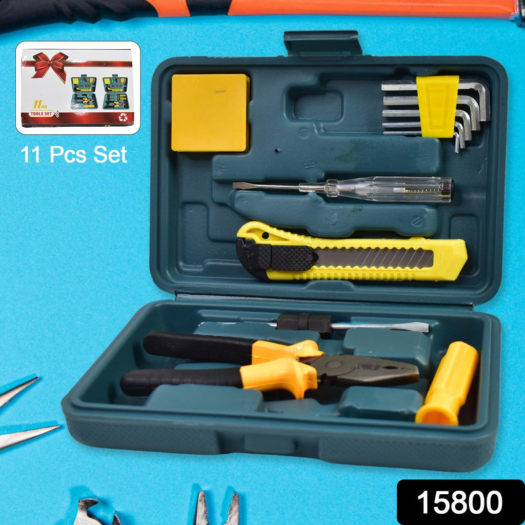 Compact hardware tool set box open, showing screwdrivers and pliers.