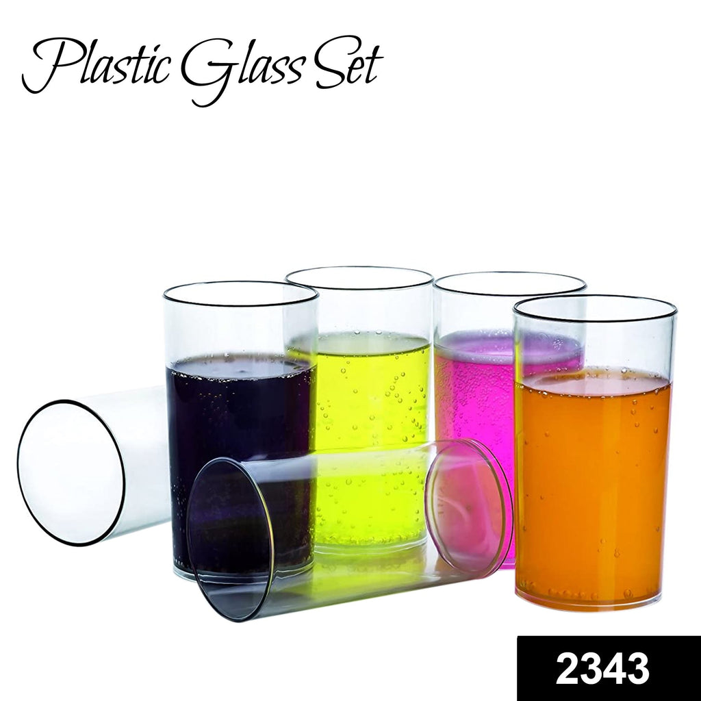 Set of six transparent plastic drinking glasses on a clean surface.