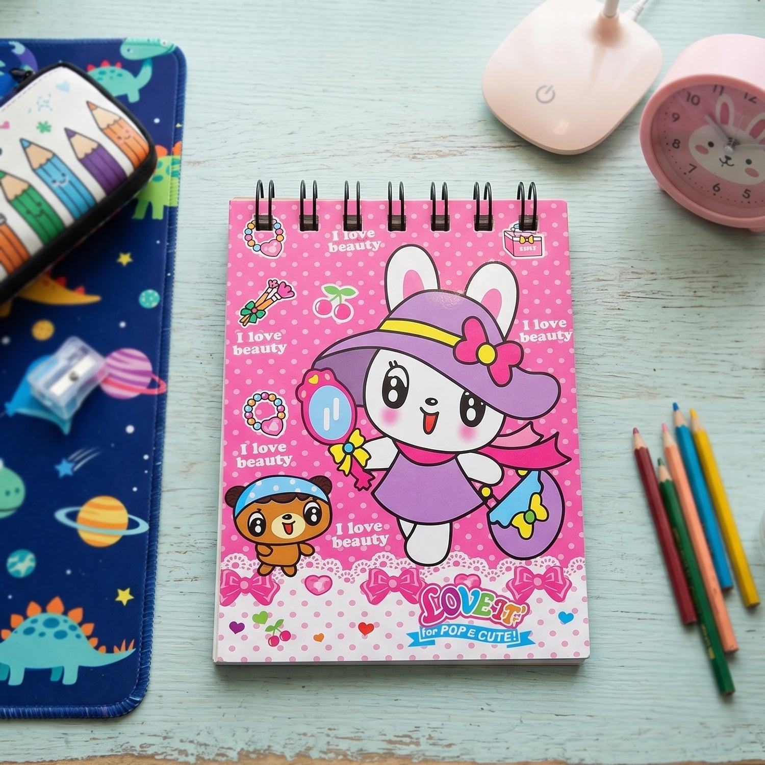 Stationery set including notebook, eraser, and sharpener in pink